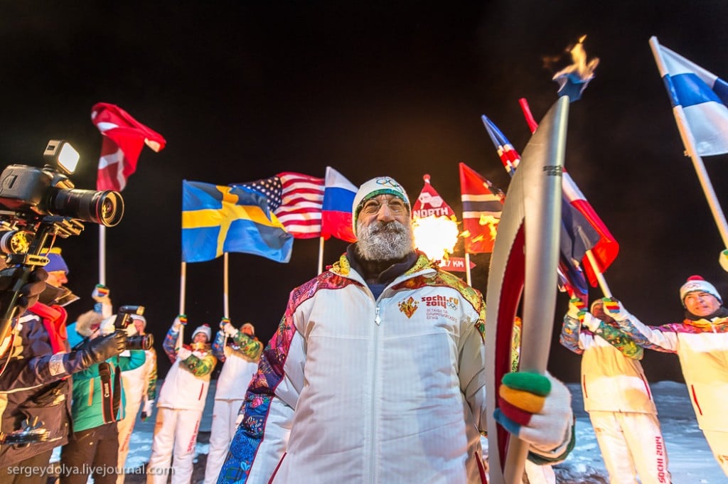 Chilingarov carrying the Olympic Torch. (c) Sergey Dolya