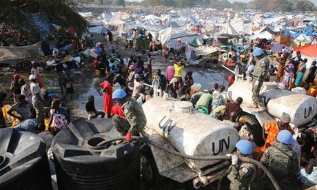 UN soldiers provide water at a refugee camp in South Sudan. Photograph: Yna/EPA 