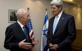 John Kerry soldiers on