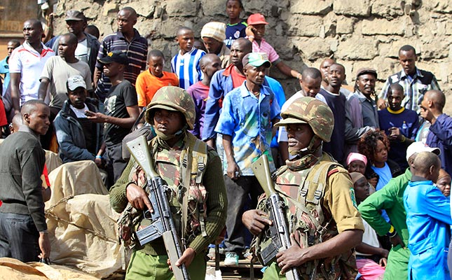 Kenyan soldiers secure area after bombing of Gikomba Market on May 16, 2014