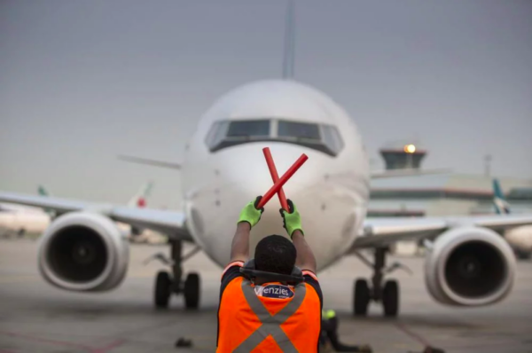 Plane lands in Toronto: Canada only implemented Covid temperature screening in July 2020. Marcus Oleniuk/Toronto Star