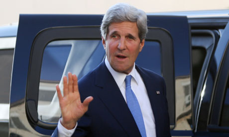 US Secretary of State John Kerry waves a
