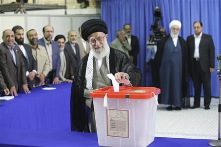 Iran's Supreme Leader Ayatollah Ali Khamenei casts his ballot at his office during the Iranian presidential election in central Tehran June 14, 2013.  Credit: REUTERS/Fars News/Hassan Mousavi