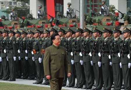 Chinese President Hu Jintao reviews army troops.  Source:  CCTV