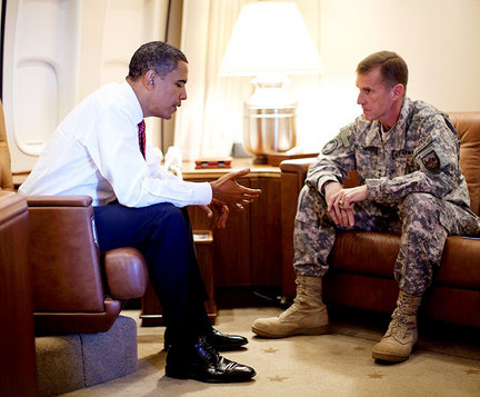 Obama and his general -- he doesn't look "uncomfortable and intimidated."  Source: www.media.syracuse.com