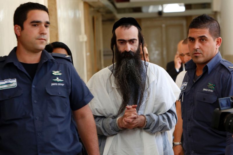 Israeli ultra-orthodox Yishai Shlissel (C), accused of stabbing six people at Pride Parade.