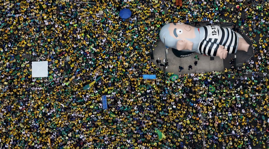 An inflatable doll known as "Pixuleco" of Brazil's former President Luiz Inacio Lula da Silva is seen during a protest against Rousseff, part of nationwide protests calling for her impeachment, in Sao Paulo, Brazil, March 13, 2016. (Paulo Whitaker / Reuters)