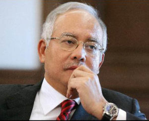 Racialism in Malaysia, Recession in Laos, and Other News