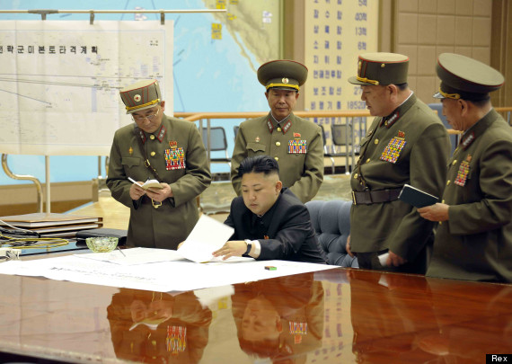 Photo released by KCNA news agency on March 29, 2013 shows top leader of the Democratic People's Republic of Korea (DPRK) Kim Jong Un attending an urgent meeting. Kim Jong Un has ratified a strike plan by the Strategic Rocket Force as U.S. B-2 stealth bombers flew over the Korean Peninsula, the KCNA news agency reported Friday. (Photo by ZUMA / Rex Features (2228810b))