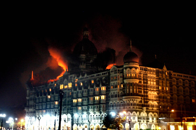 Fire engulfs the top floor of the Taj Mahal hotel, site of one of the shootouts with terrorists in Mumbai on Nov. 26, 2008. (Pal Pillai/AFP/Getty Images) Source: ProPublica.com