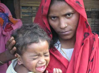 Rohingya woman and her child