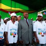 Senegalese President Abdoulaye Wade welcoming Haitians students