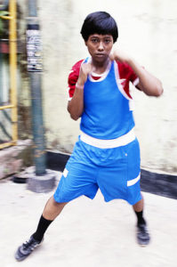 A young female boxer from the Kidderpore area. Source: Wall Street Journal