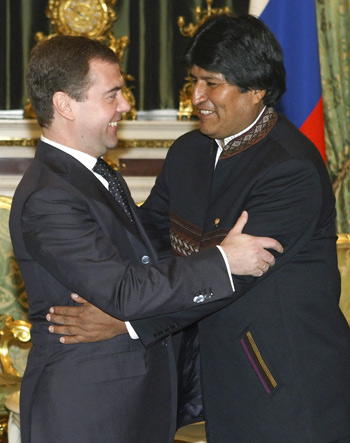 Medvedev gives a Russian bear-hug to Morales.  Credit: Xinhua/Reuters