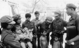 Chan Phal with Vietnamese soldiers - Tuol Sleng
